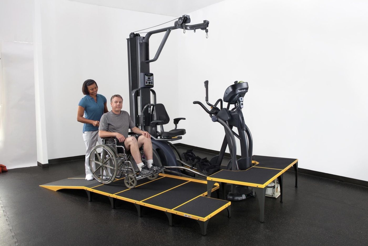 Accessible exercise equipment with wheelchair transfer
